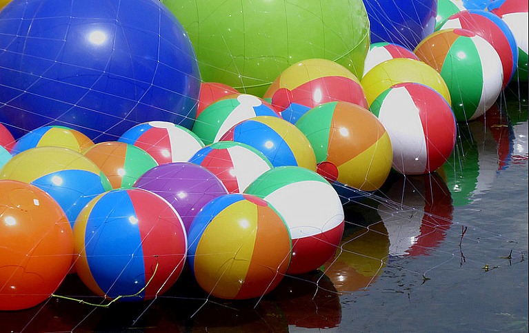 #801 A beach ball has us bouncing with joy - 1K Smiles